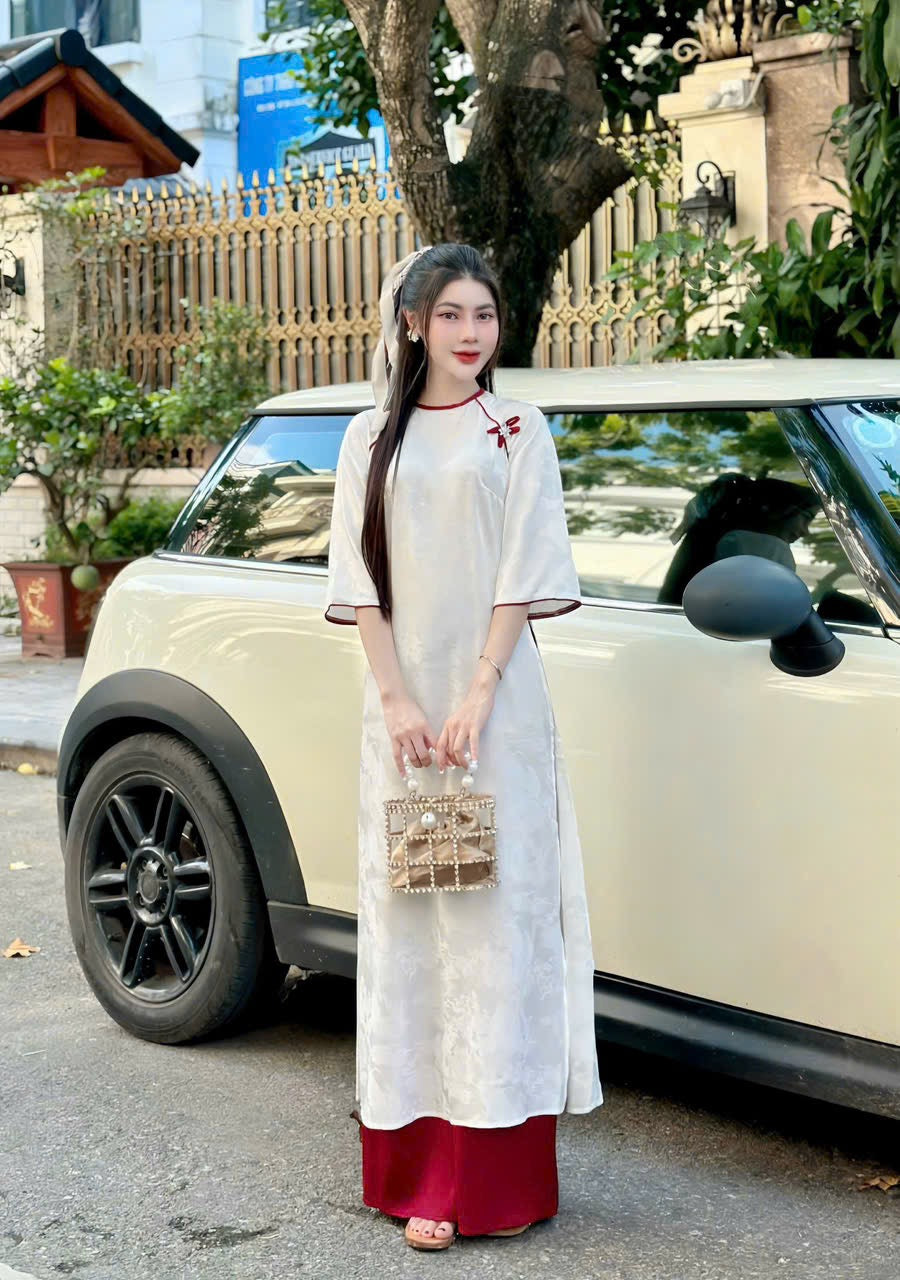T391 only áo - Áo dài gấm trắng Long Phụng viền cổ đỏ đính nơ