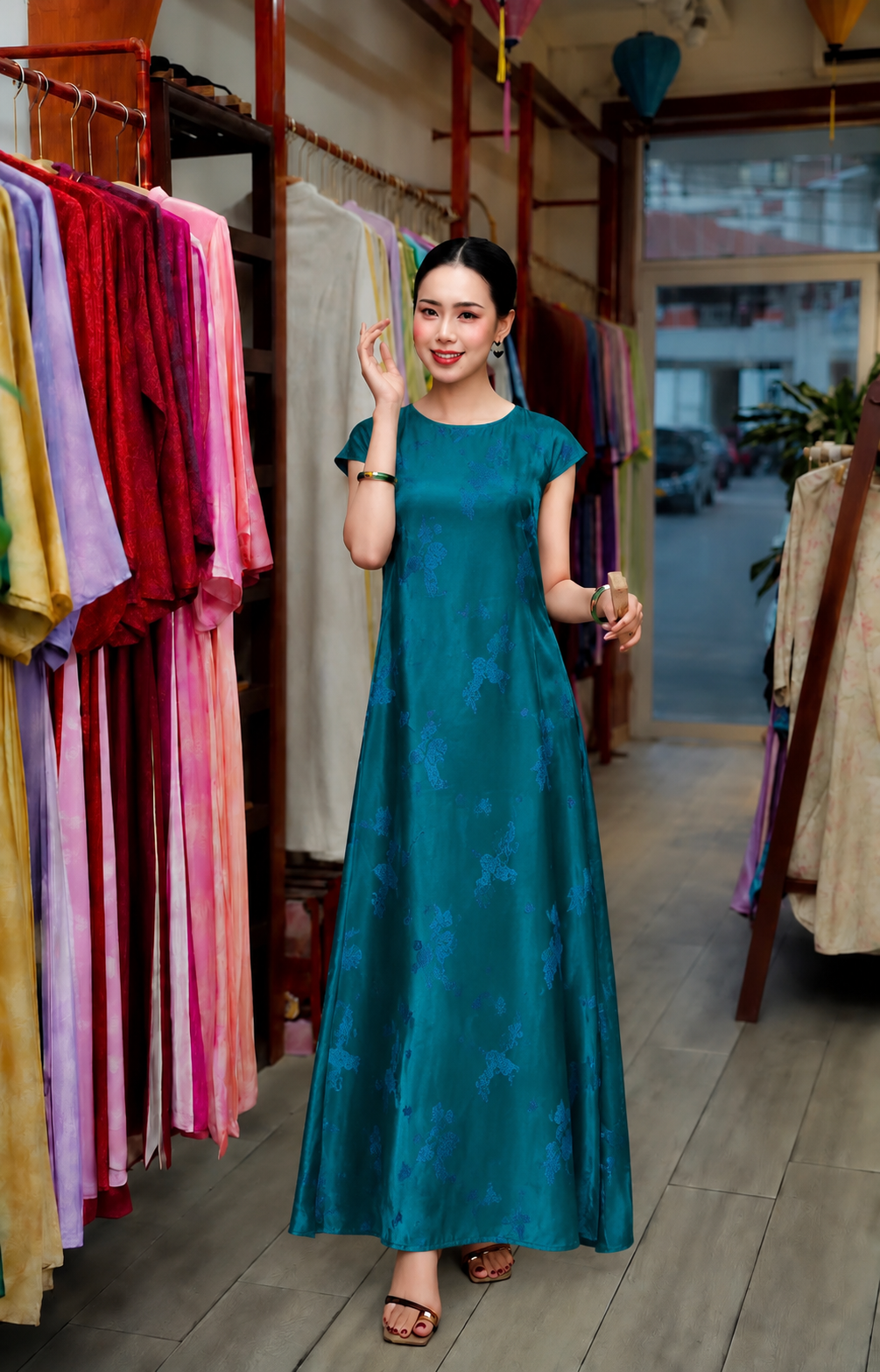 V104 - Đầm dài tay hến lụa sen dạ cúc màu xanh có túi có xẻ sau