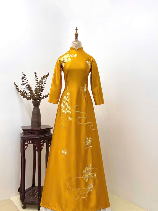 T498 - Áo dài Lụa Ruby vàng thêu hoa cao cấp