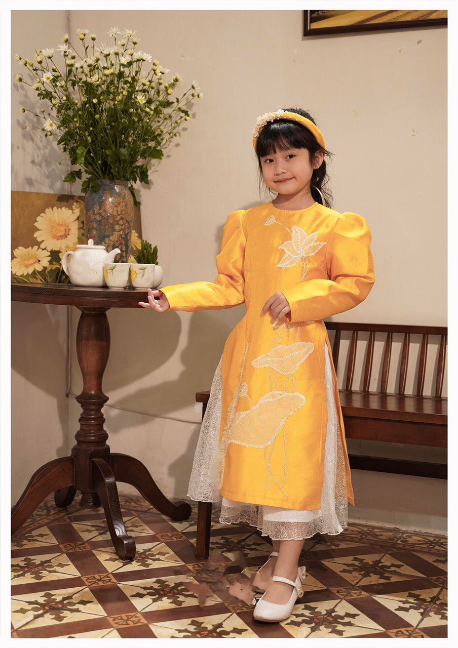 BL130 Áo + quần - Áo dài bé Gái màu vàng
