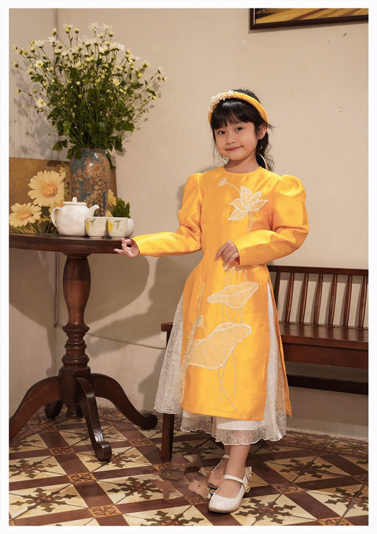 BL130 Áo + quần - Áo dài bé Gái màu vàng