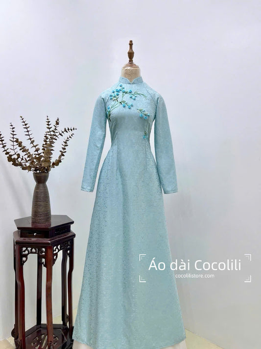 H606 Áo only no pants - Áo dài lụa hoa cúc thêu màu xanh da trời