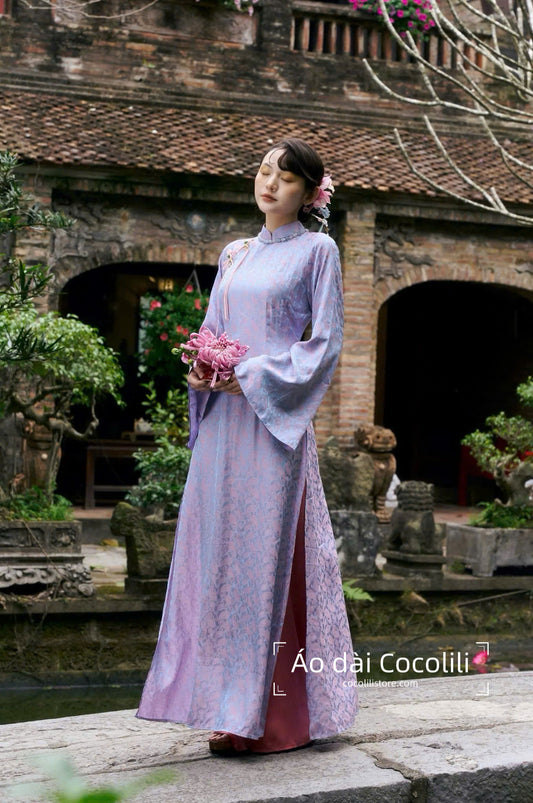 H6321 4236 Áo only no pants - Áo dài dáng suông 2 tà gấm lông công tím cà đính khuy (không viền cổ áo)